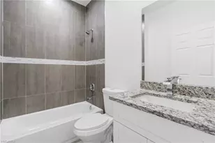 566 Woodview Dr, Lehigh Acres, FL 33972 - Photo 9