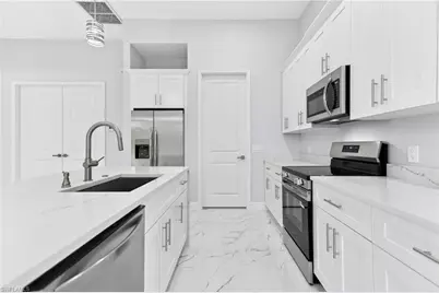 1118 Bari St E, Lehigh Acres, FL 33974 - Photo 17