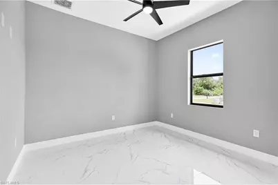 1114 Bari St E, Lehigh Acres, FL 33974 - Photo 31