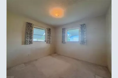 1419 Kimdale St E, Lehigh Acres, FL 33936 - Photo 19