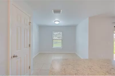313 Shadow Lakes Dr, Lehigh Acres, FL 33974 - Photo 9