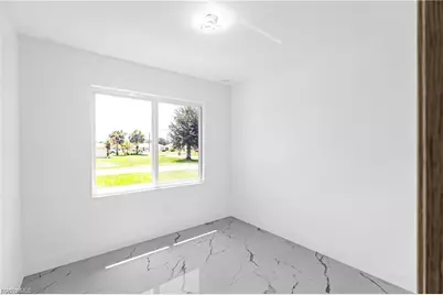 718 Robert Ave, Lehigh Acres, FL 33936 - Photo 9