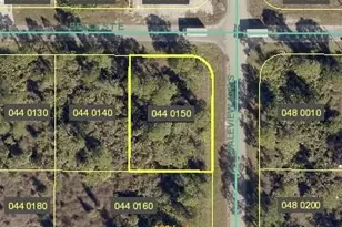 1058 Bells St E, Lehigh Acres, FL 33974 - Photo 1