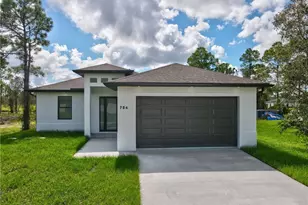 704 Avondale St E, Lehigh Acres, FL 33974 - Photo 3