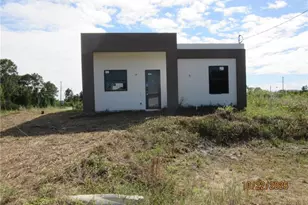 824 Clow St E, Lehigh Acres, FL 33974 - Photo 1