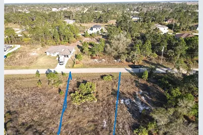 1038 Bassinger Ave S, Lehigh Acres, FL 33974 - Photo 1