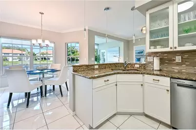 1054 Egrets Walk Cir #102, Naples, FL 34108 - Photo 15