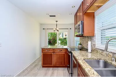 566 Beachwalk Cir, Naples, FL 34108 - Photo 11