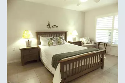 15475 Cedarwood Ln #104, Naples, FL 34110 - Photo 13