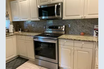 3595 Laurel Greens Ln N #103, Naples, FL 34119 - Photo 5