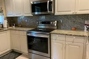 3595 Laurel Greens Ln N, Naples, FL 34119 - Photo 5