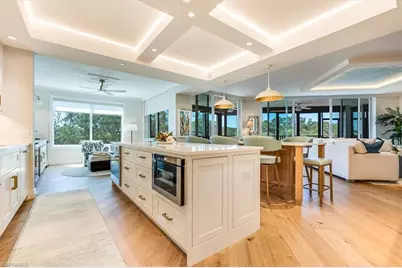 445 Cove Tower Dr #302, Naples, FL 34110 - Photo 1