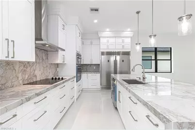 3074 Pine Tree Dr, Naples, FL 34112 - Photo 5