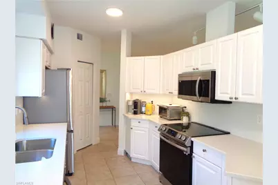 515 Laguna Royale Blvd #102, Naples, FL 34119 - Photo 9