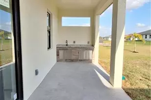 2911 22nd St SW, Lehigh Acres, FL 33976 - Photo 29