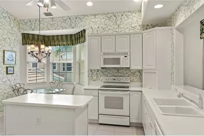 6035 Trophy Dr #103, Naples, FL 34110 - Photo 5