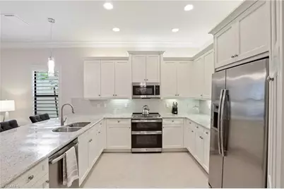 13435 Silktail Dr, Naples, FL 34109 - Photo 9