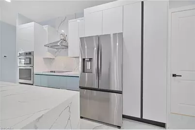 900 NW 12th Pl, Cape Coral, FL 33993 - Photo 13