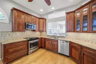 11384 Quail Village Way, Naples, FL 34119 - Photo 5