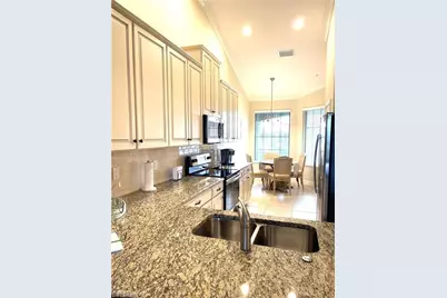 9426 Benevenuto Ct #203, Naples, FL 34119 - Photo 7