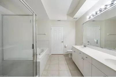 7099 Pond Cypress Ct #102, Naples, FL 34109 - Photo 15