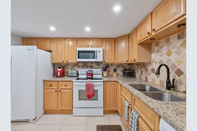 151 Cypress Way E #E101, Naples, FL 34110 - Photo 5