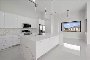 909 SW 11th Ct, Cape Coral, FL 33991 - Photo 7