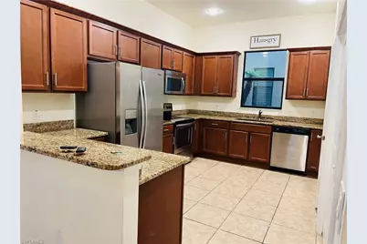 1292 Kendari Terrace Kendari Terrace, Naples, FL 34113 - Photo 1