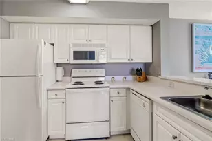 1265 Wildwood Lakes Blvd, Naples, FL 34104 - Photo 11