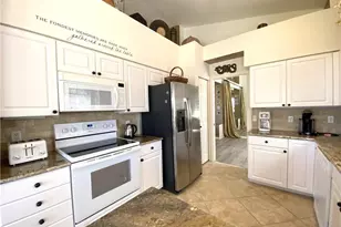 1570 Winding Oaks Way, Naples, FL 34109 - Photo 13