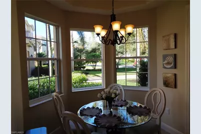 562 Avellino Isles Cir #102, Naples, FL 34119 - Photo 9