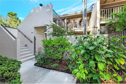 15400 Cedarwood Ln #1-201, Naples, FL 34110 - Photo 1