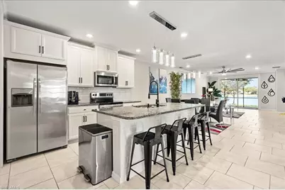 14672 Edgewater Cir, Naples, FL 34114 - Photo 11