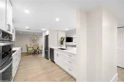 5601 Turtle Bay Dr #302, Naples, FL 34108 - Photo 11