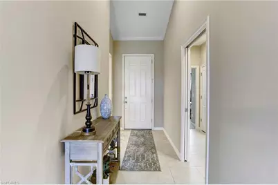 9433 Benvenuto Ct #201, Naples, FL 34119 - Photo 1