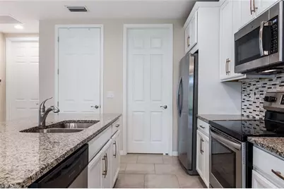 14533 Edgewater Cir, Naples, FL 34114 - Photo 7