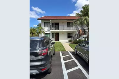 4983 Pepper Cir #H-201, Naples, FL 34113 - Photo 1