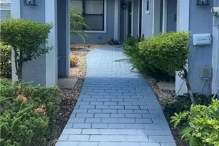 11735 Quail Village Way, Naples, FL 34119 - Photo 1