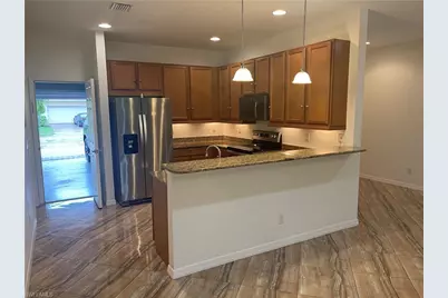 15326 Summit Place Cir, Naples, FL 34119 - Photo 3