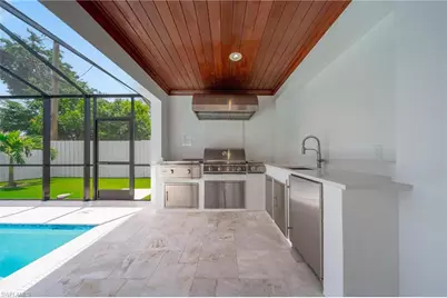 1300 Hilltop Dr, Naples, FL 34103 - Photo 27