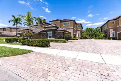 9550 Ironstone Ter #201, Naples, FL 34120 - Photo 1