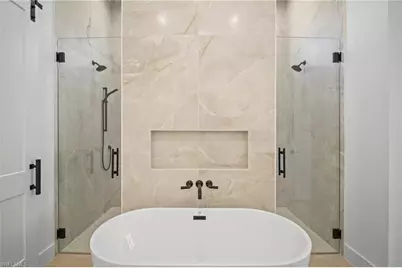 25400 Divot Dr, Bonita Springs, FL 34135 - Photo 19