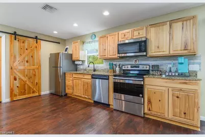 2916 9th St SW, Lehigh Acres, FL 33976 - Photo 13