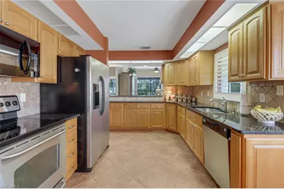 11745 Quail Village Way, Naples, FL 34119 - Photo 5