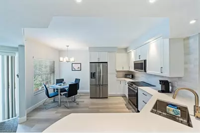 6914 Satinleaf Rd N #103, Naples, FL 34109 - Photo 11