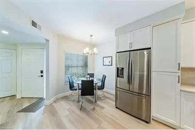 6914 Satinleaf Rd N #103, Naples, FL 34109 - Photo 9