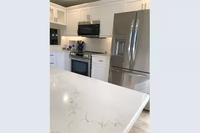 3032 Sandpiper Bay Cir #G203, Naples, FL 34112 - Photo 7