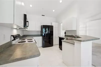 24797 Lakemont Cove Ln #202, Bonita Springs, FL 34134 - Photo 5