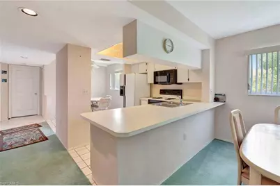 234 Pebble Beach Blvd #305, Naples, FL 34113 - Photo 9