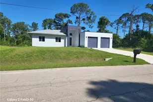 521 Frank Jewett Ave S, Lehigh Acres, FL 33974 - Photo 1
